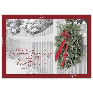 Custom greeting cards with white picket fence and decorated wreath.